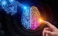 Graphic of a robotic hand is on the left side of the picture, and touching the left hemisphere of the brain which is in blue. On the right hand side of the picture, a human hand is pointing to the middle at the right hemisphere of the brain in rainbow.