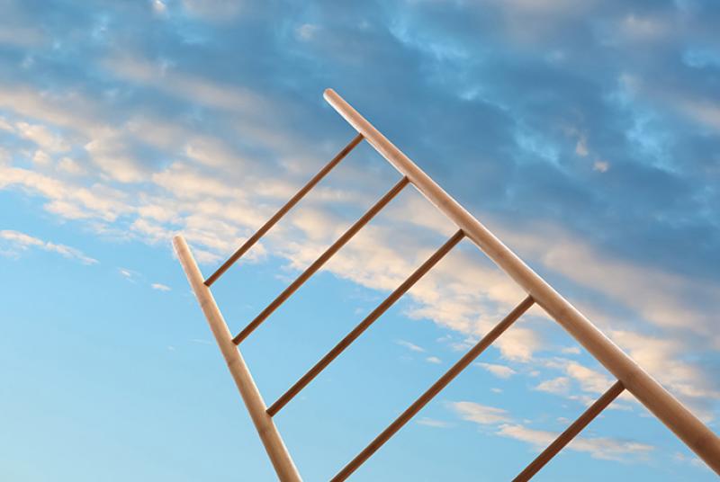 Wooden ladder against blue sky with clouds, low angle view
